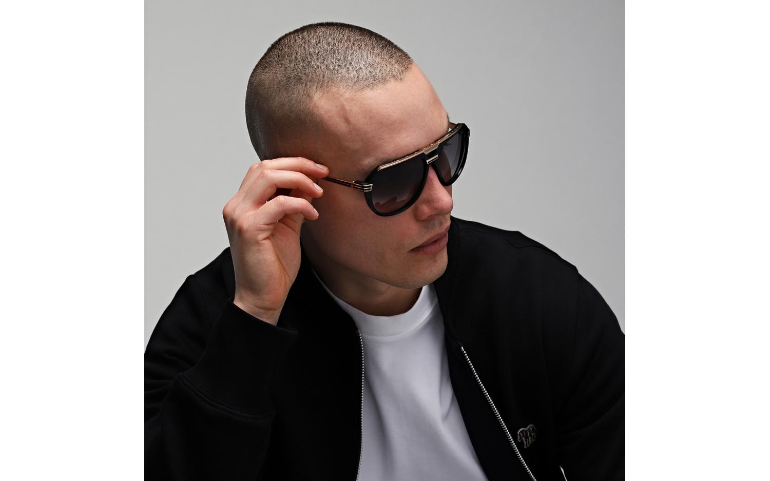 Gallery image for /media/thumbs/100x62.5/media/product_images/cazal-sunglasses-674-001-modelfw100fh62.5.jpg